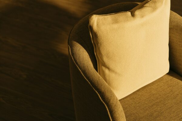Close-up of a textured cushion showing rich fabric detail